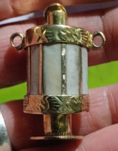 Gold and white antique enamel holder