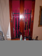 Antique wormy chestnut gun cabinet 