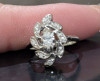 1940s-1950's white gold floral setting marquise center diamond 8 accent diamonds